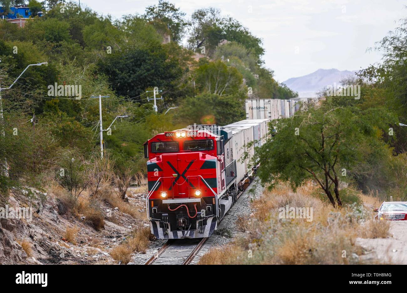 Train or Mexican railways passing through the popular colony in Ranchito and Metalera. Now conicido as Ferromex. Train station FERROMEX in Hermosillo...  Tren o ferrocarriles mexicanos en su paso por la colonia popular en Ranchito y Metalera. Ahora conicido como Ferromex. Estacion de tren FERROMEX en Hermosillo (photo: Luis Gutierrez/NortePhoto) Stock Photo