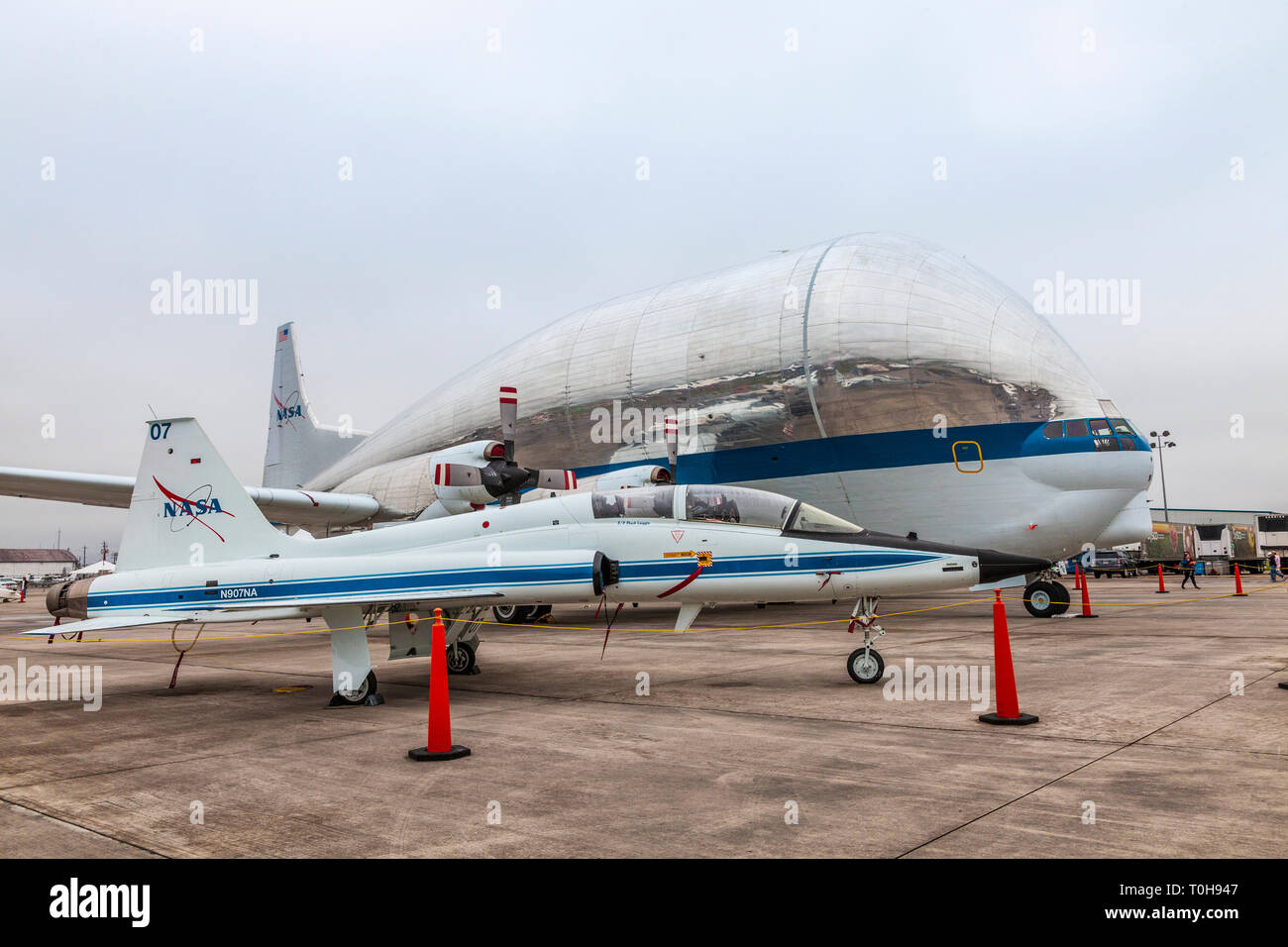 NASA Super Guppy Turbine cargo plane and NASA T-38 Talon at 2018 Wings over Houston Air Show in Houston, Texas. Blue Angels Airshow. Stock Photo