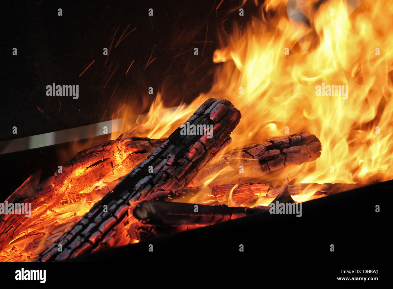 A Shot Of Burning Firewood In The Fireplace Close Up Burning