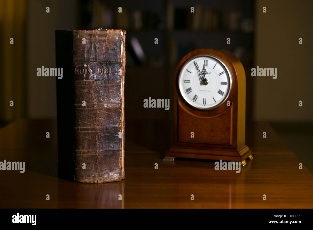 Bible and clock Stock Photo Alamy