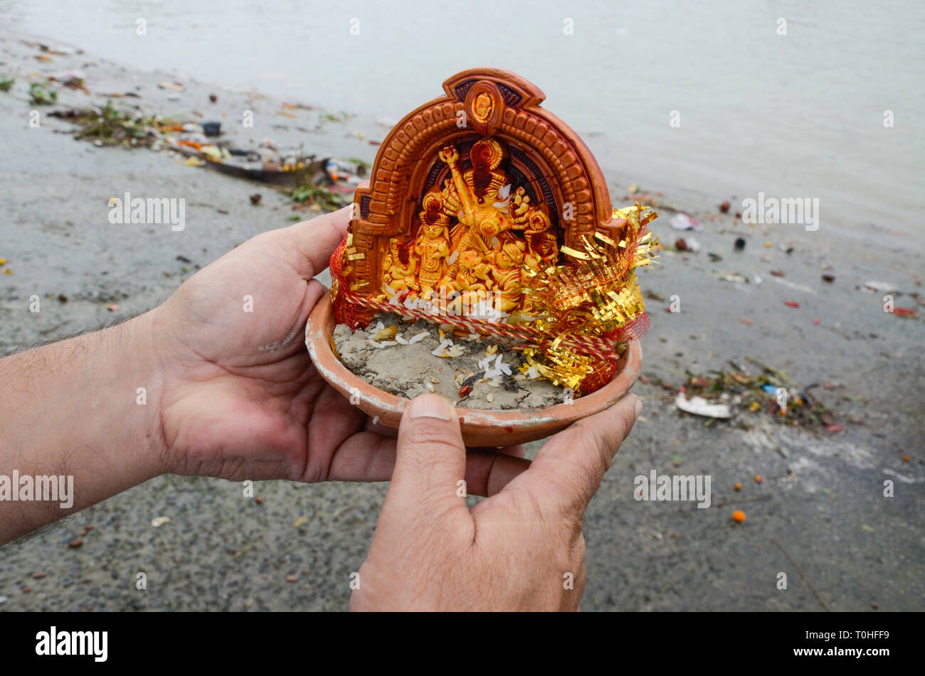 small Goddess idol immersion at Hooghly river, Kolkata, West Bengal, India, Asia Stock Photo