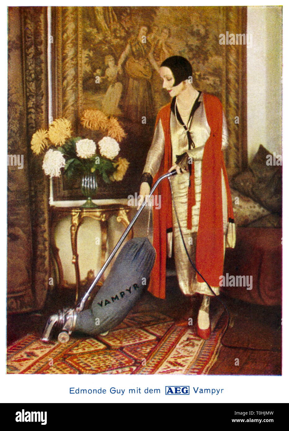 household, vacuum-clean, vacuum cleaner, caption: Edmonde Guy with the AEG  Vampyr, advertising postcard, Germany, circa 1929,  Additional-Rights-Clearance-Info-Not-Available Stock Photo - Alamy