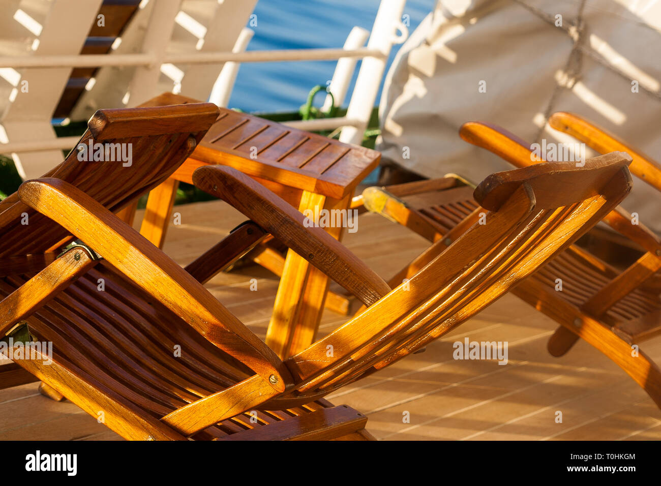 wooden deck seating on the QE2's promenade deck Stock Photo Alamy
