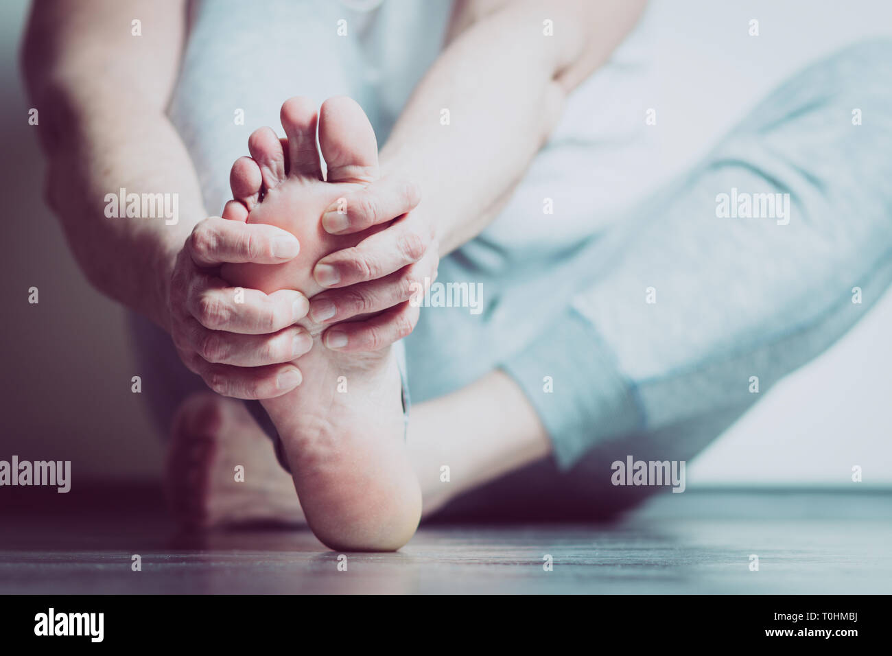 Painful feet hires stock photography and images Alamy