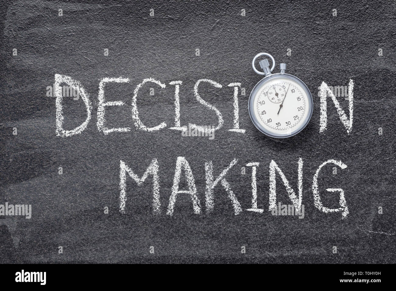Decision Making Phrase Written On Chalkboard With Vintage Stopwatch 