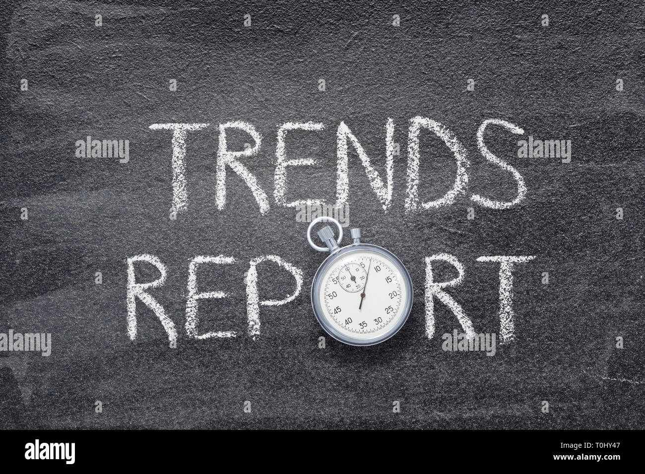 Trends Report Written On Chalkboard With Vintage Stopwatch Used Instead 