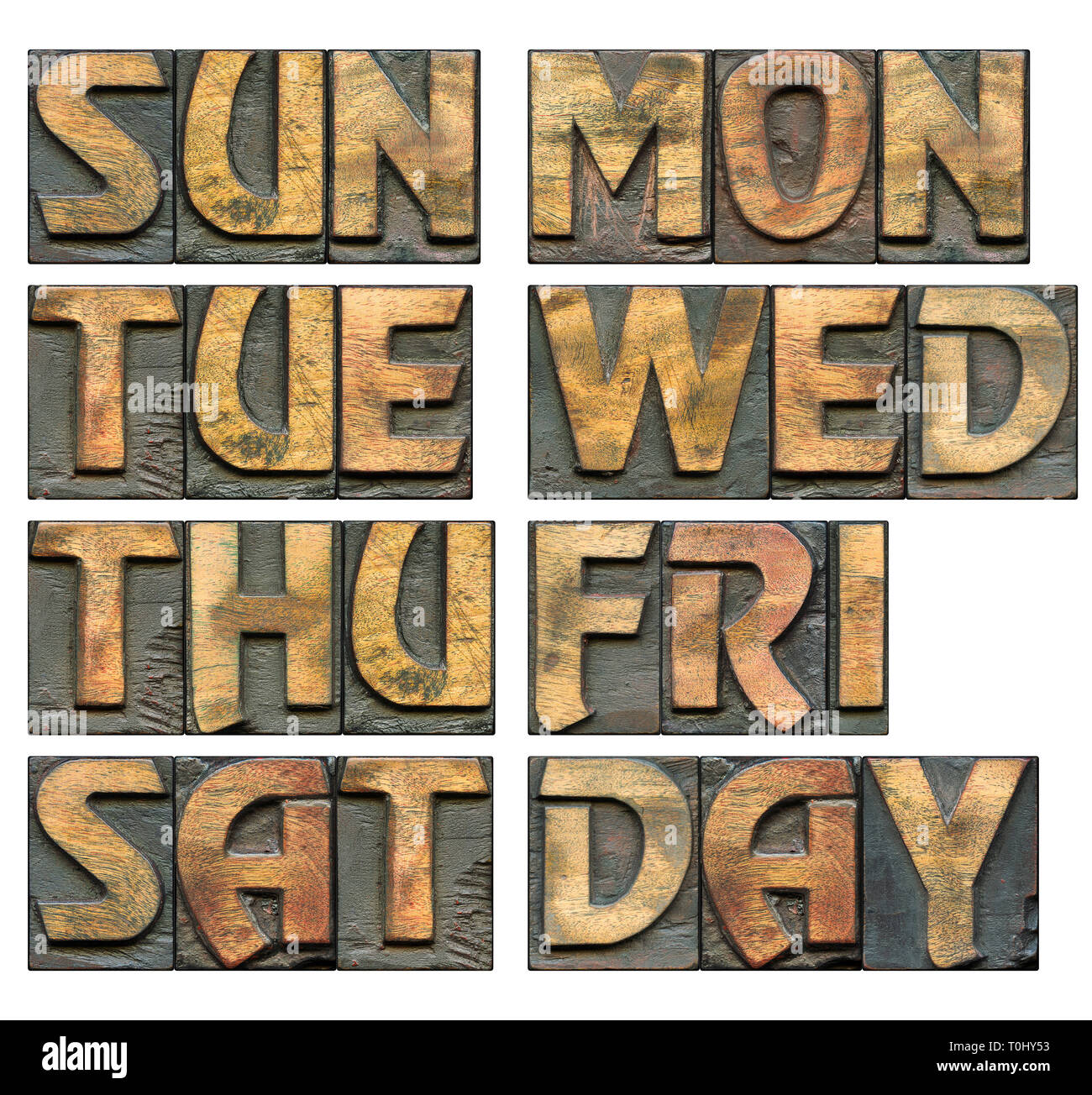 weekdays abbreviation set made from bold wooden letterpress on white background, every symbol is 1200 pixels in height Stock Photo