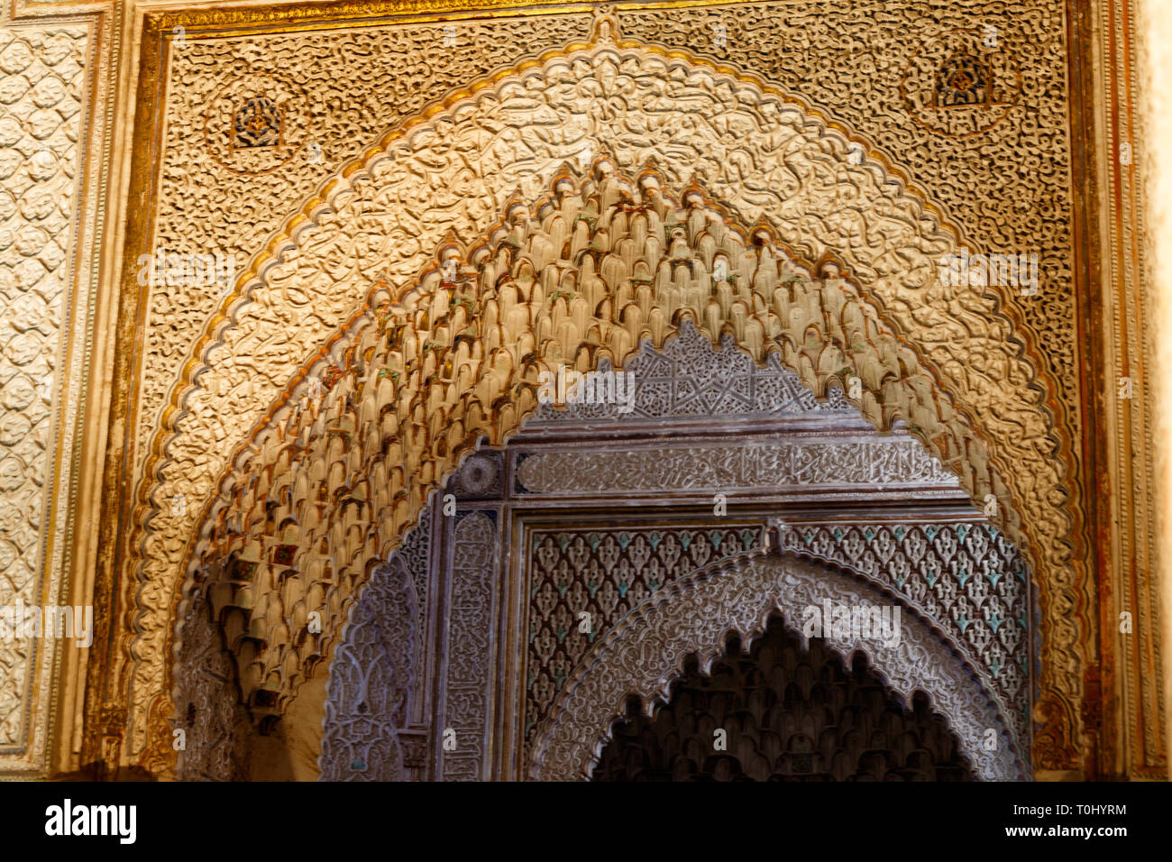 Traditional arabic Colorful Ancient style mosaic and ornament in interior elements. Abstract geometry, carved vintage pattern in Marrakesh, Morocco, A Stock Photo