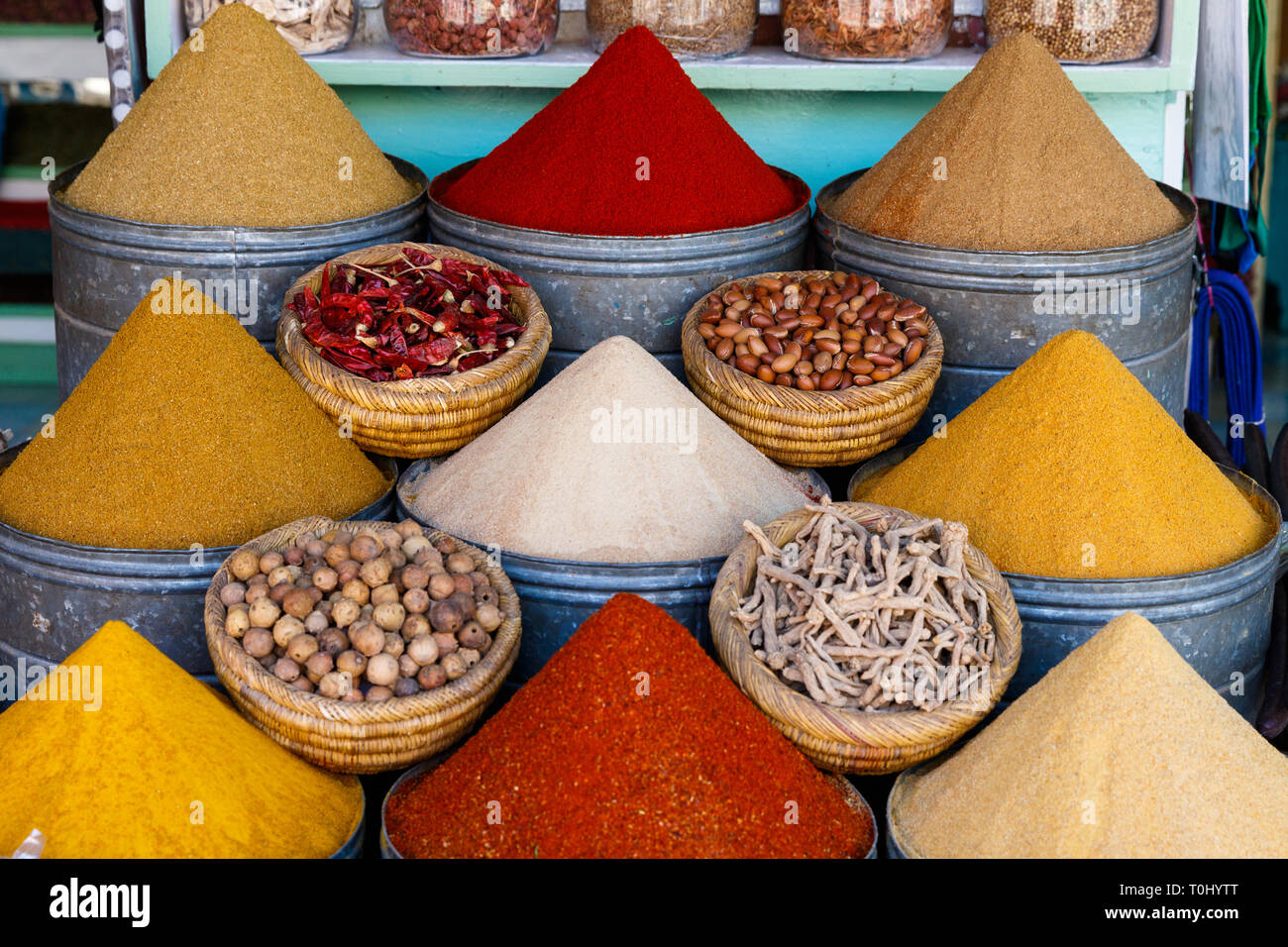 Colorful cooking Spices and flower in traditional local medina bazaar market in Marrakesh, Morocco Stock Photo