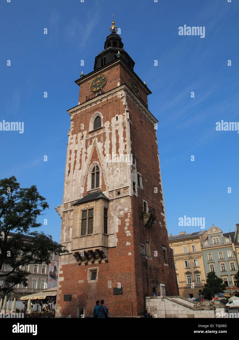 Krakow square clock tower Stock Photo Alamy
