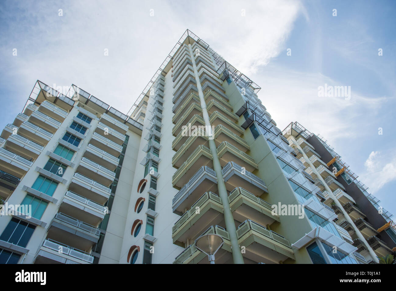 Darwin, Northern Territory, Australia-December 22,2017: 130 Esplanade apartments under a blue sky with clouds in downtown Darwin, Australia Stock Photo