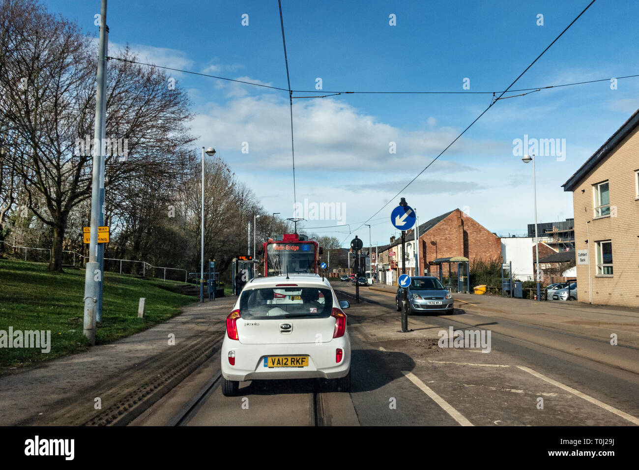 Driving on a tram route on a single carraigeway Stock Photo