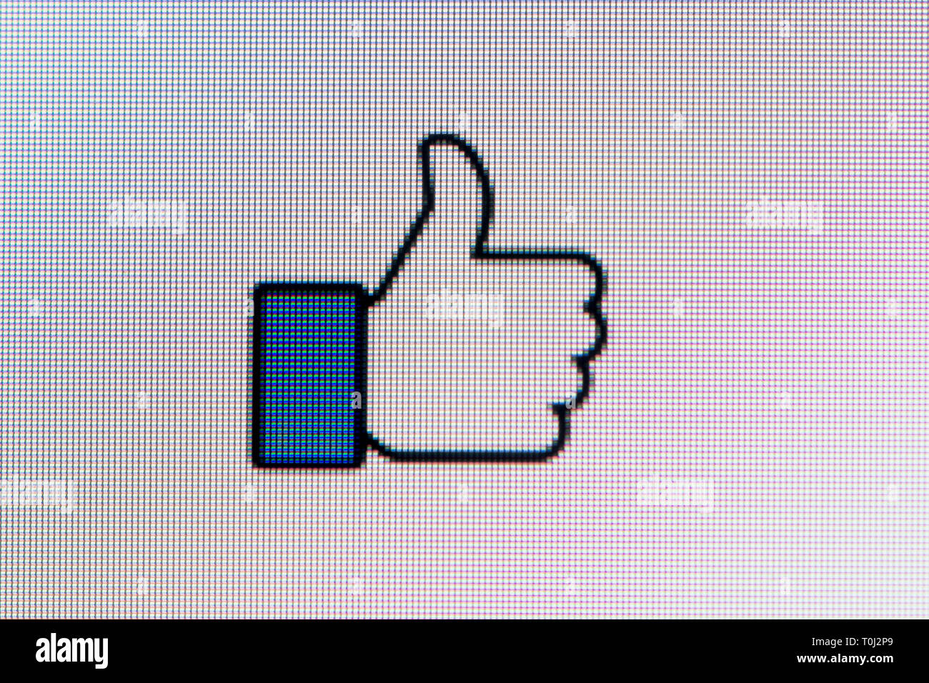 The Facebook like icon as seen on a computer screen (Editorial use only). Stock Photo