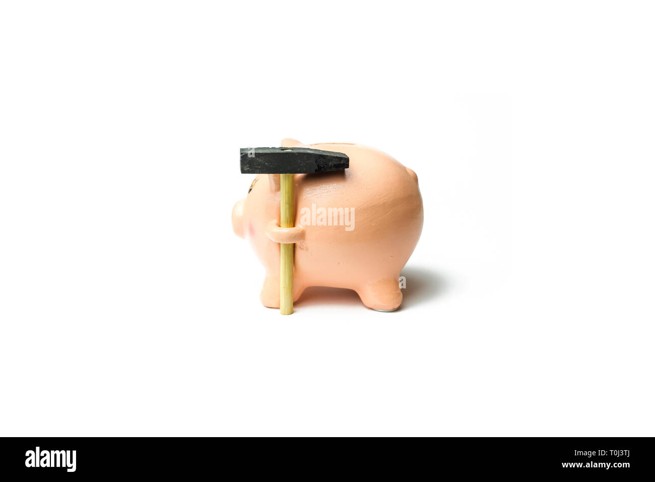 Piggy Bank with small Hammer isolated on white Stock Photo - Alamy