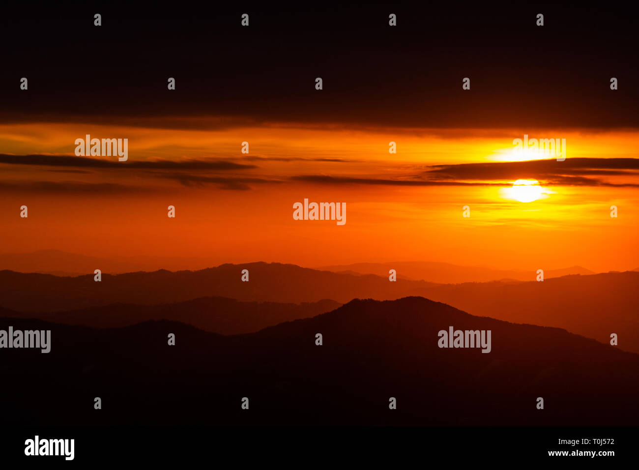 Beautiful sunset over mountains layers in Umbria (Italy Stock Photo - Alamy