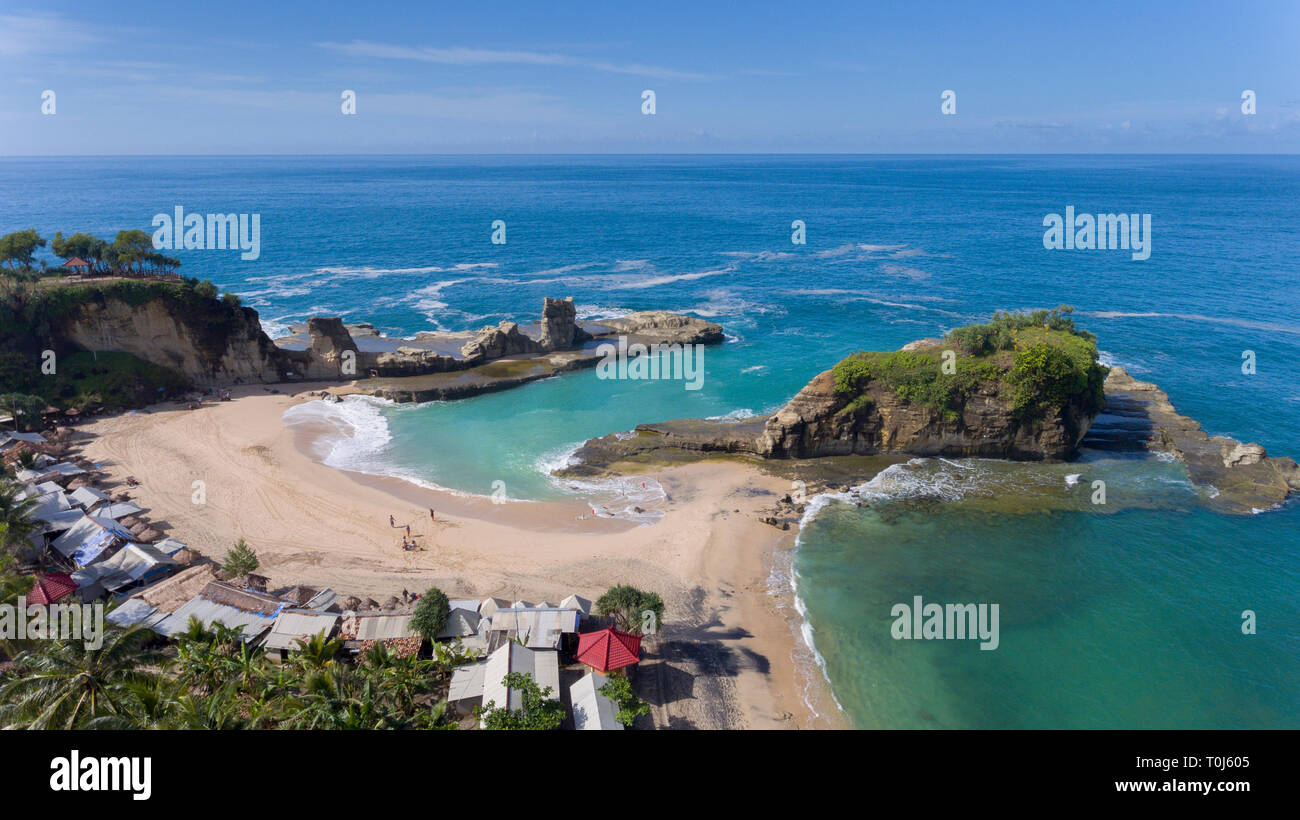 Klayar beach, a scenic and popular tourist attraction in Pacitan, East Java. Photogenic location and the ocean's flute bursting from fissure draw peop Stock Photo