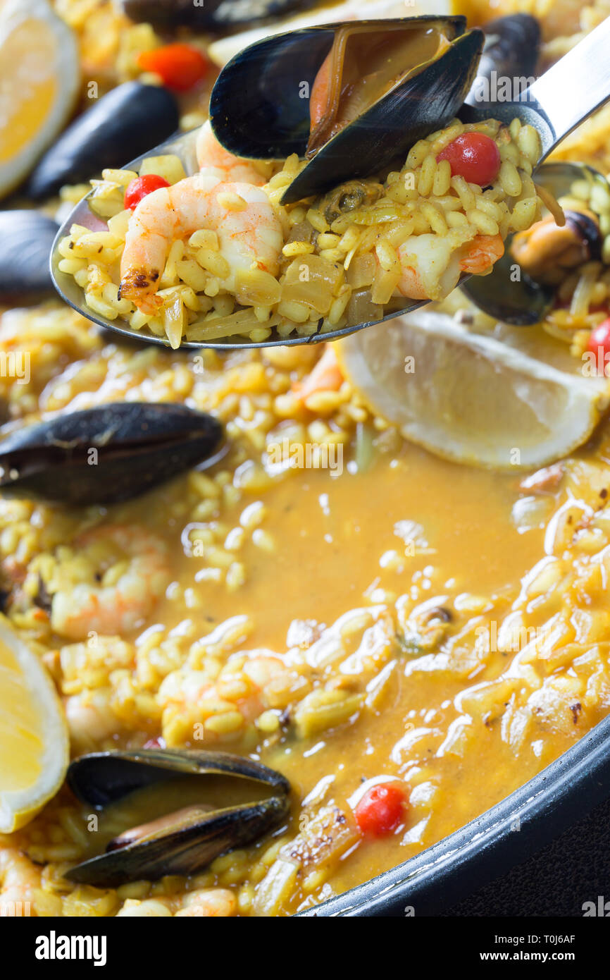 A traditional Spanish dish of Shellfish Paella. Stock Photo