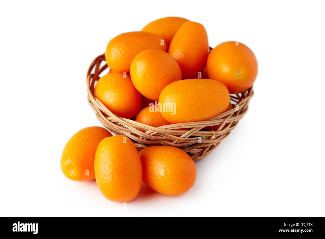 Kumquats or cumquats (Citrus japonica) isolated on white background