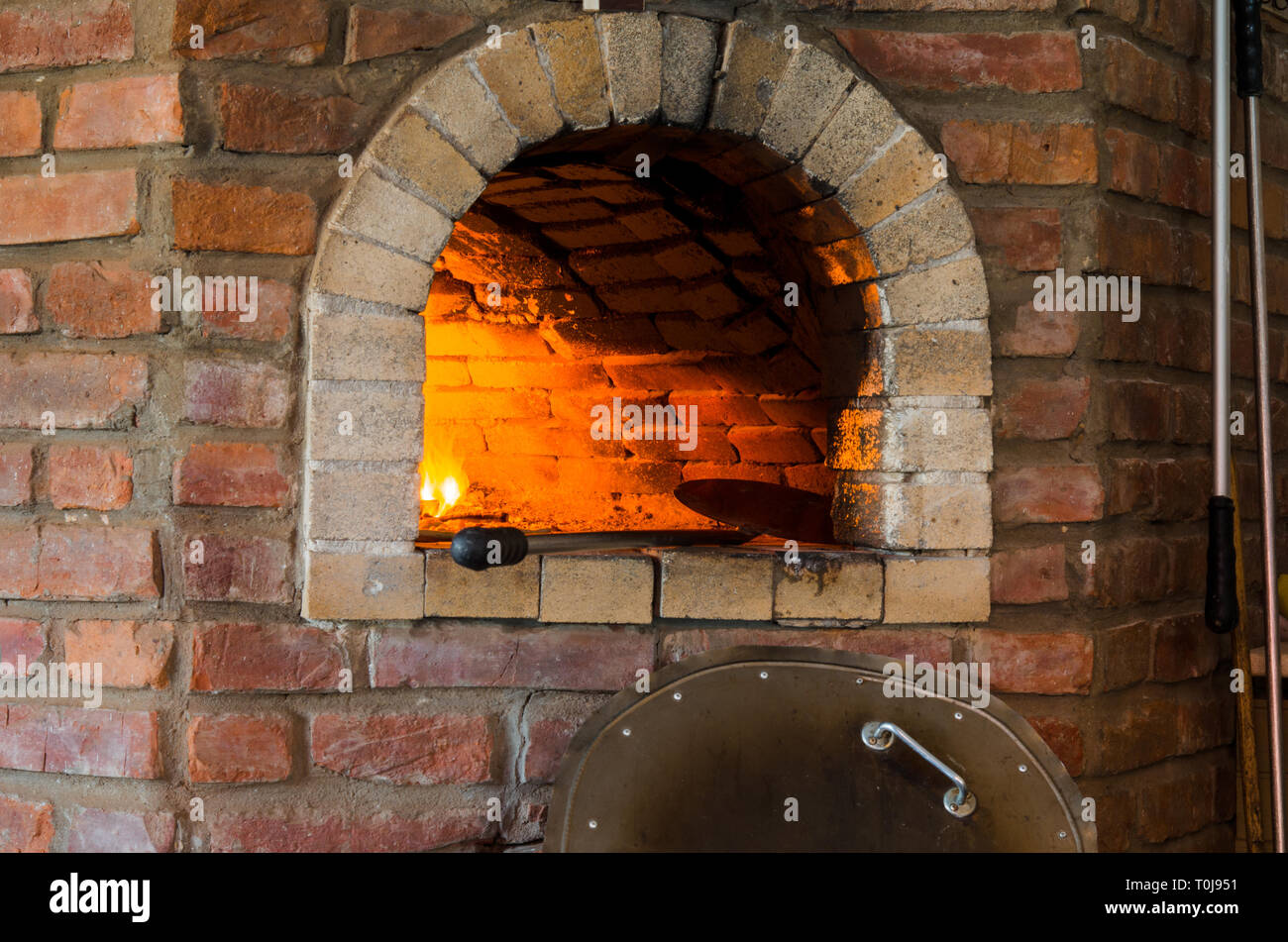 Image Clay Oven With Fire Stock Photo, Picture and Royalty Free Image.  Image 141417249.