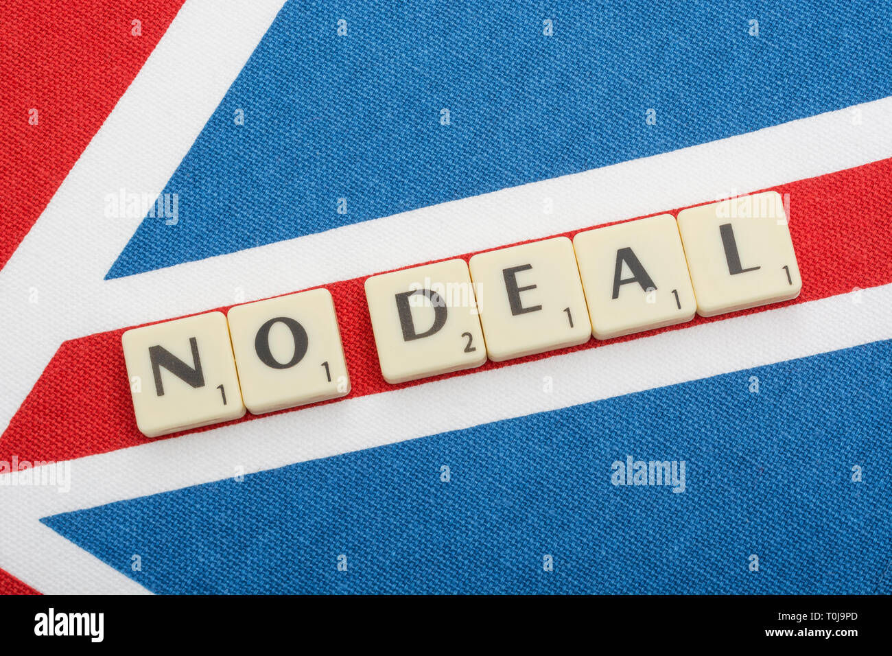 Union Jack & Brexit 'No Deal' motif in scrabble-style letters, in regard to staying or exiting EU, Cancel Brexit petition concept, No-Deal Brexit. Stock Photo