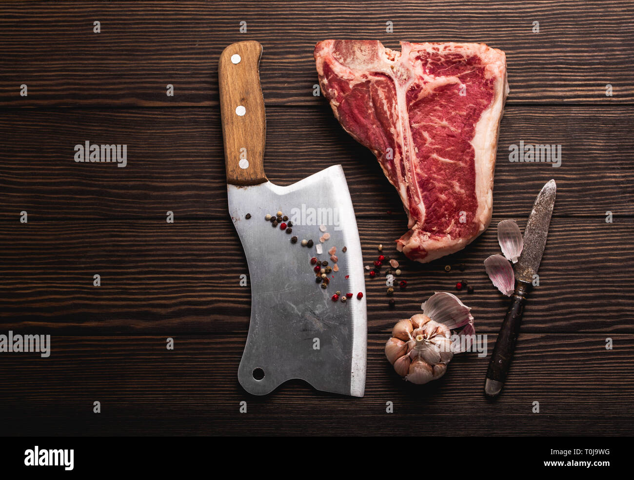Tbone and meat cleaver Stock Photo Alamy
