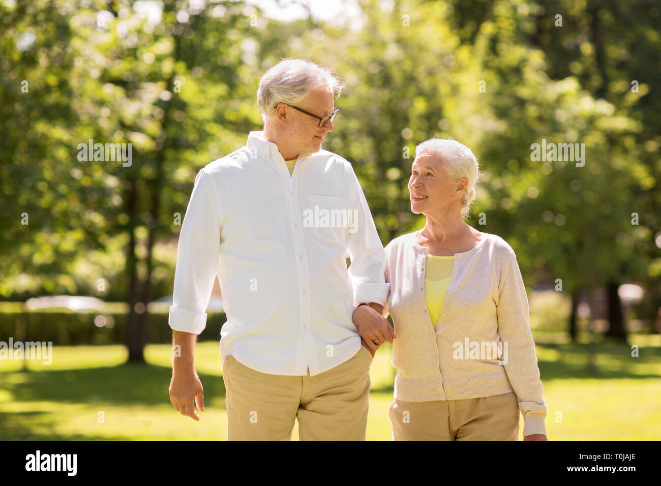 Cute old couple walking holding hands hi-res stock photography and ...