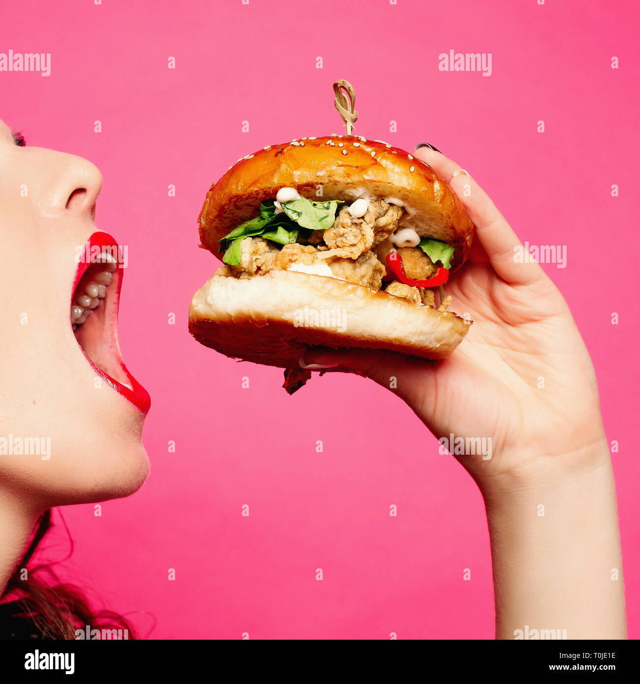 Holding cheeseburger hi res stock photography and images Alamy Holding cheeseburger hi res stock photography and images Alamy