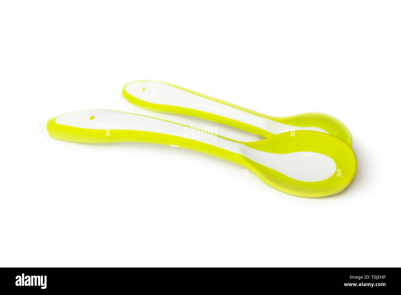 Two plastic spoons with silicone edges for feeding babies Stock Photo