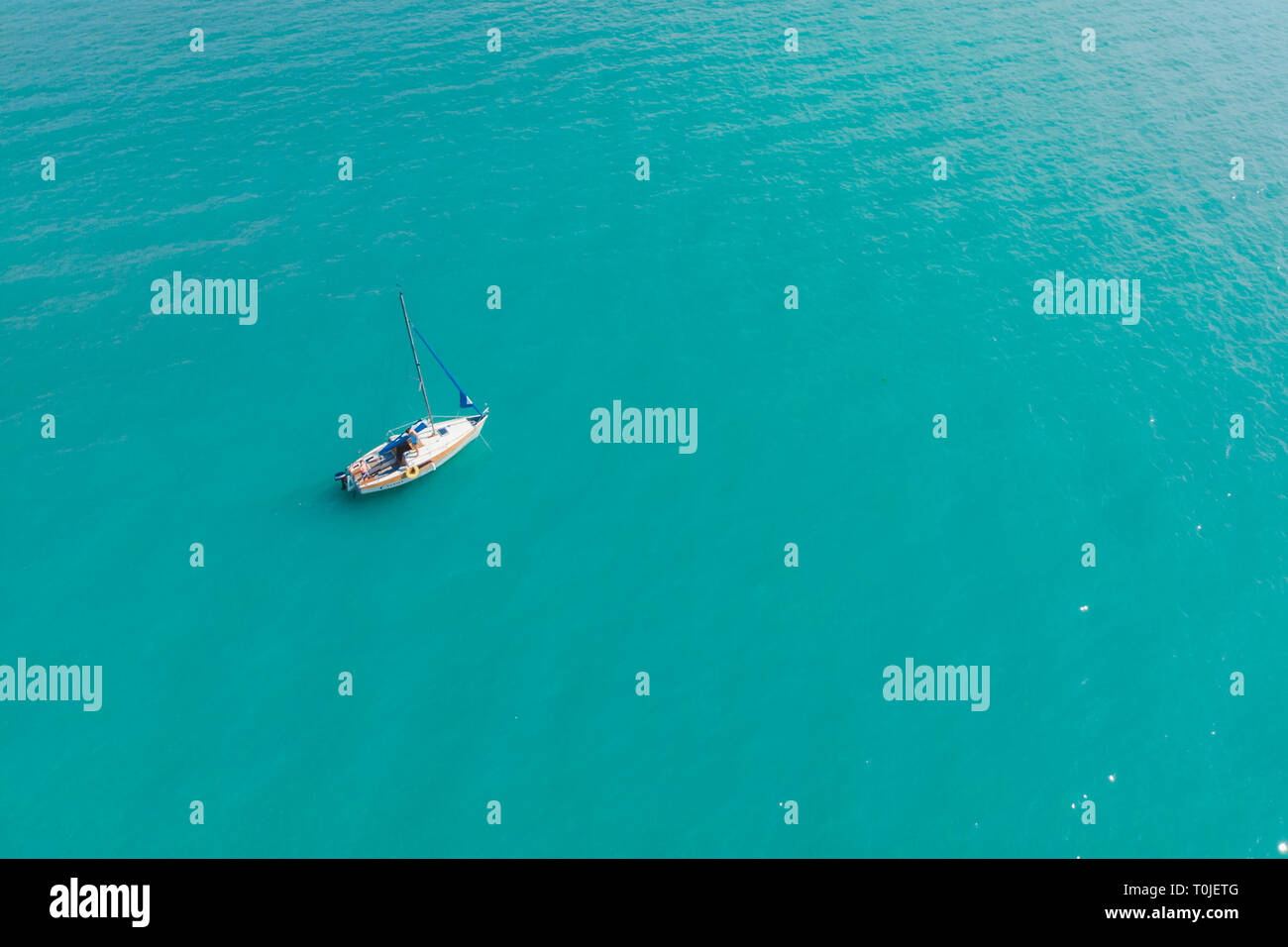 aerial view of boat in blue water. summer time Stock Photo - Alamy