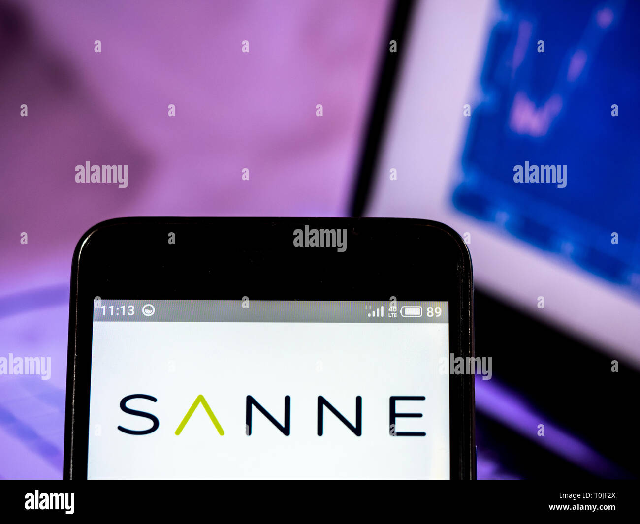 Sanne Group logo seen displayed on smart phone Stock Photo Alamy