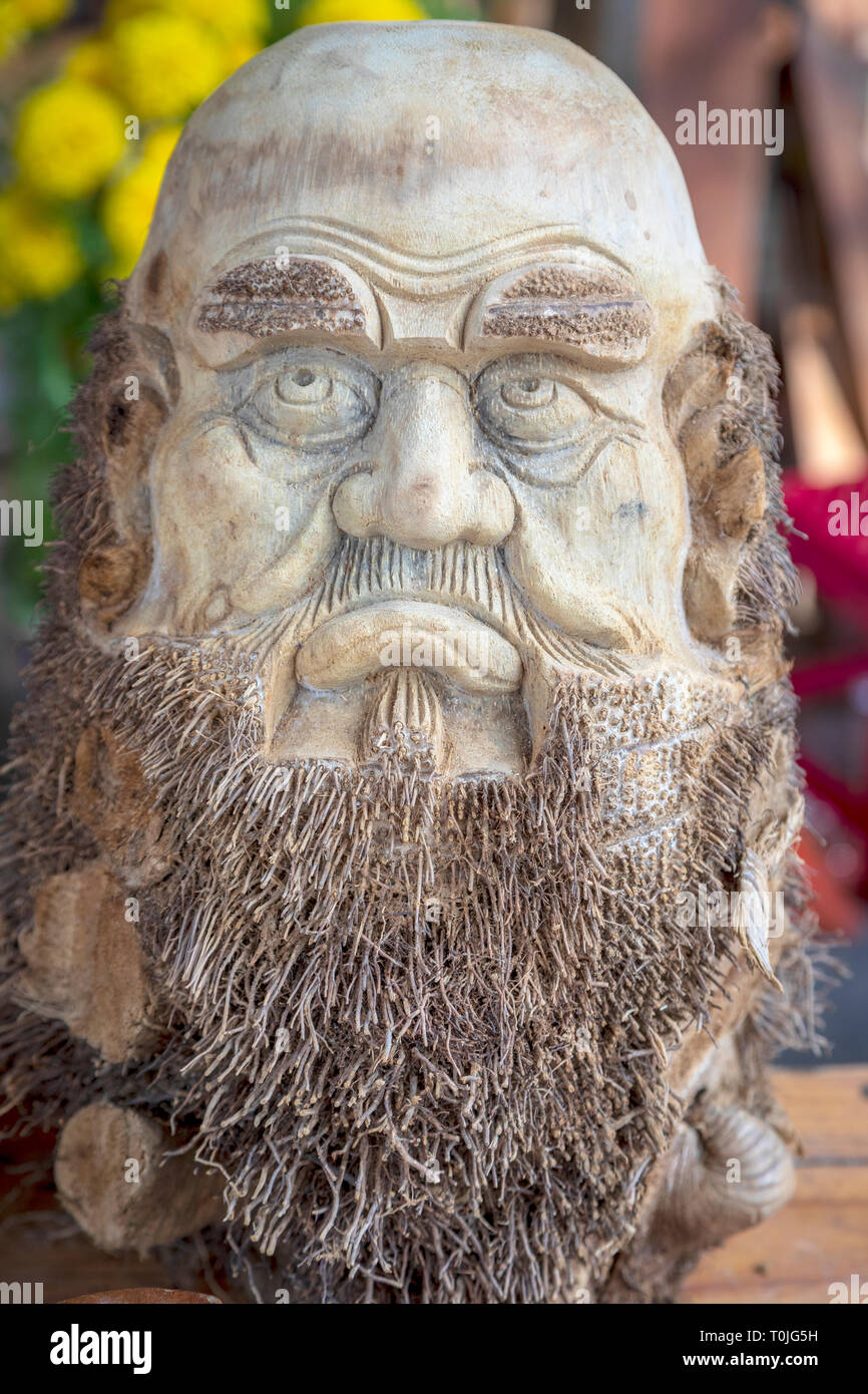 A wooden carving of the respected Polish Kazimierz Kwiatkowski, practically forgotten in his homeland, was known and respected in Vietnam. Stock Photo