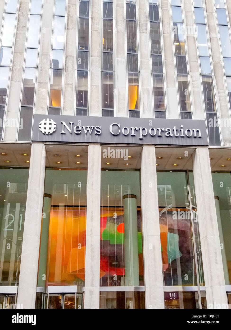 Sign on facade at entrance to office of News Corporation, parent company of Fox News, in Manhattan, New York City, New York, February 6, 2019. () Stock Photo