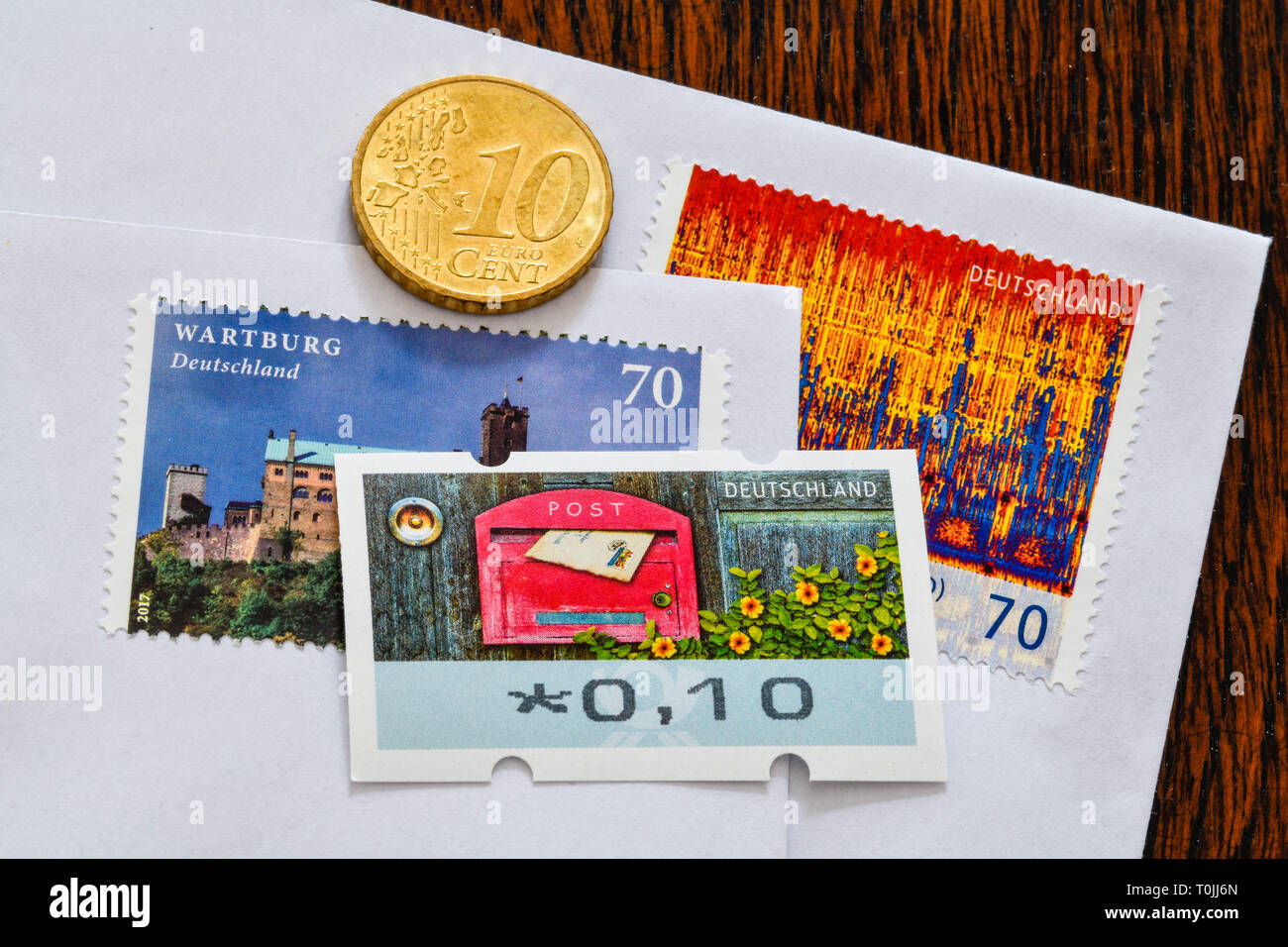 German stamps 70 cents and 10 cents, symbolic photo Portoerhöhung, Deutsche Briefmarken 70 Cent und 10 Cent, Symbolfoto Portoerhöhung Stock Photo