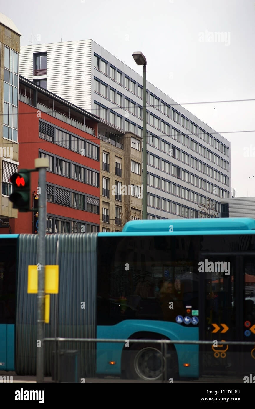 A bus at a traffic light junction at the Konstablerwache corner Kurt-Schumacher-Street Frankfurt. Stock Photo