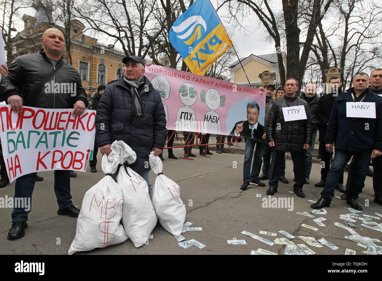 Bloody Money Stock Photos Bloody Money Stock Images Alamy - kiev ukraine 20th mar 2019 protestors hold placards wich says poroshenko