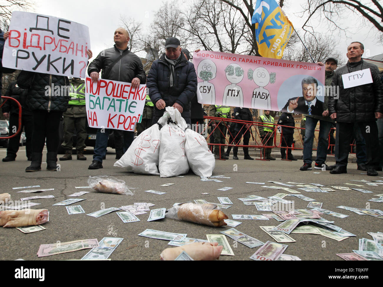 Bloody Money Stock Photos Bloody Money Stock Images Alamy - kiev ukraine 20th mar 2019 protestors hold placards wich says poroshenko