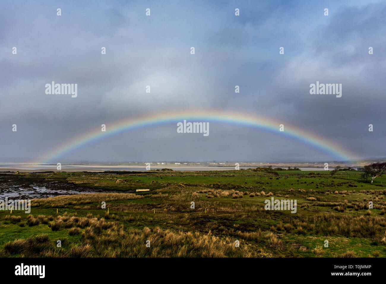 Ardara, County Donegal, Ireland. 20th March 2019. A rainbow appears on a day of sunshine and showers on the north-west coast. Credit: Richard Wayman/Alamy Live News Credit: Richard Wayman/Alamy Live News Stock Photo