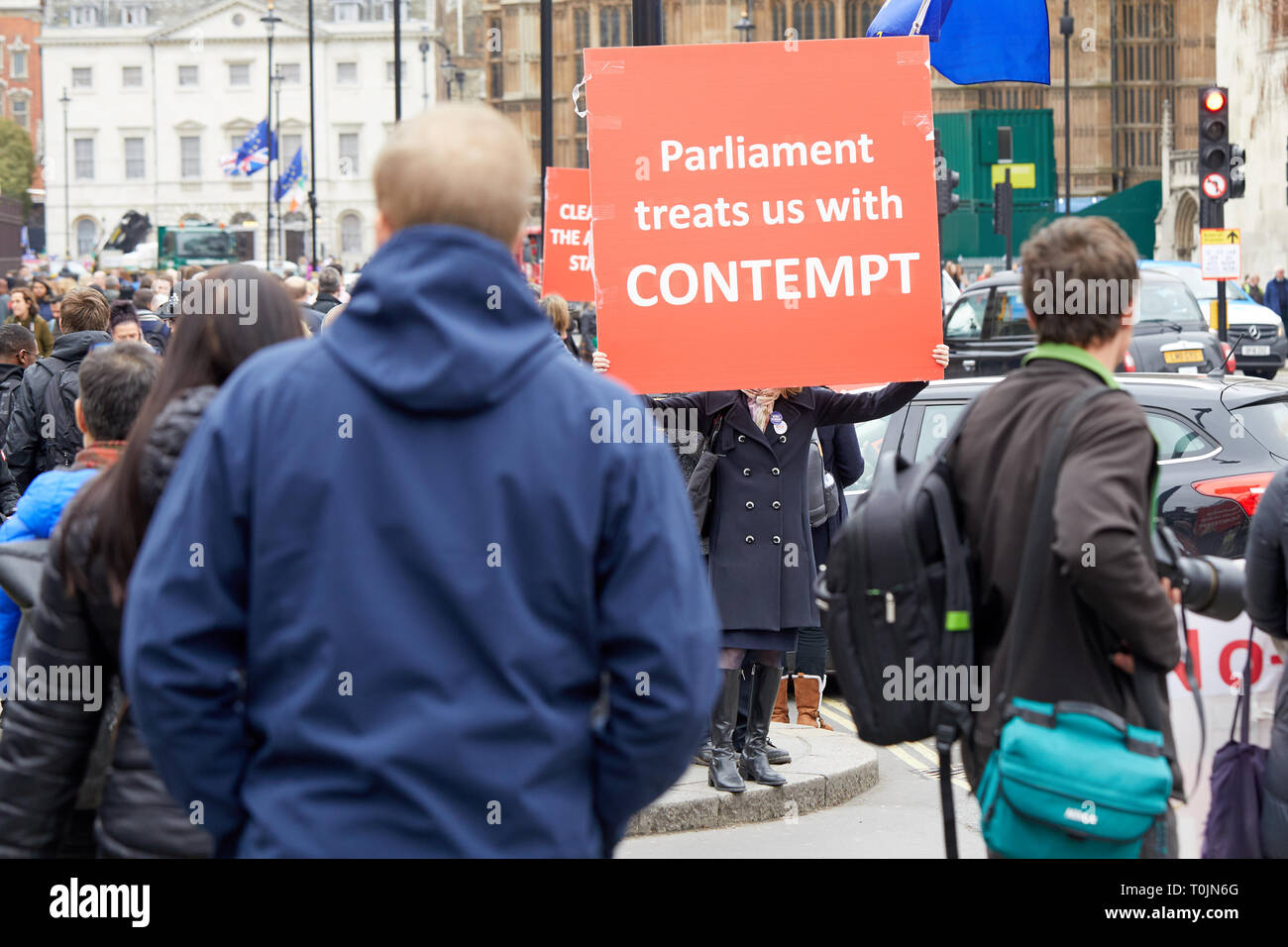 London, UK. - March 20, 2019: A Leave supporter campaigning with a large placard outside Parliament. Credit: Kevin J. Frost/Alamy Live News Stock Photo