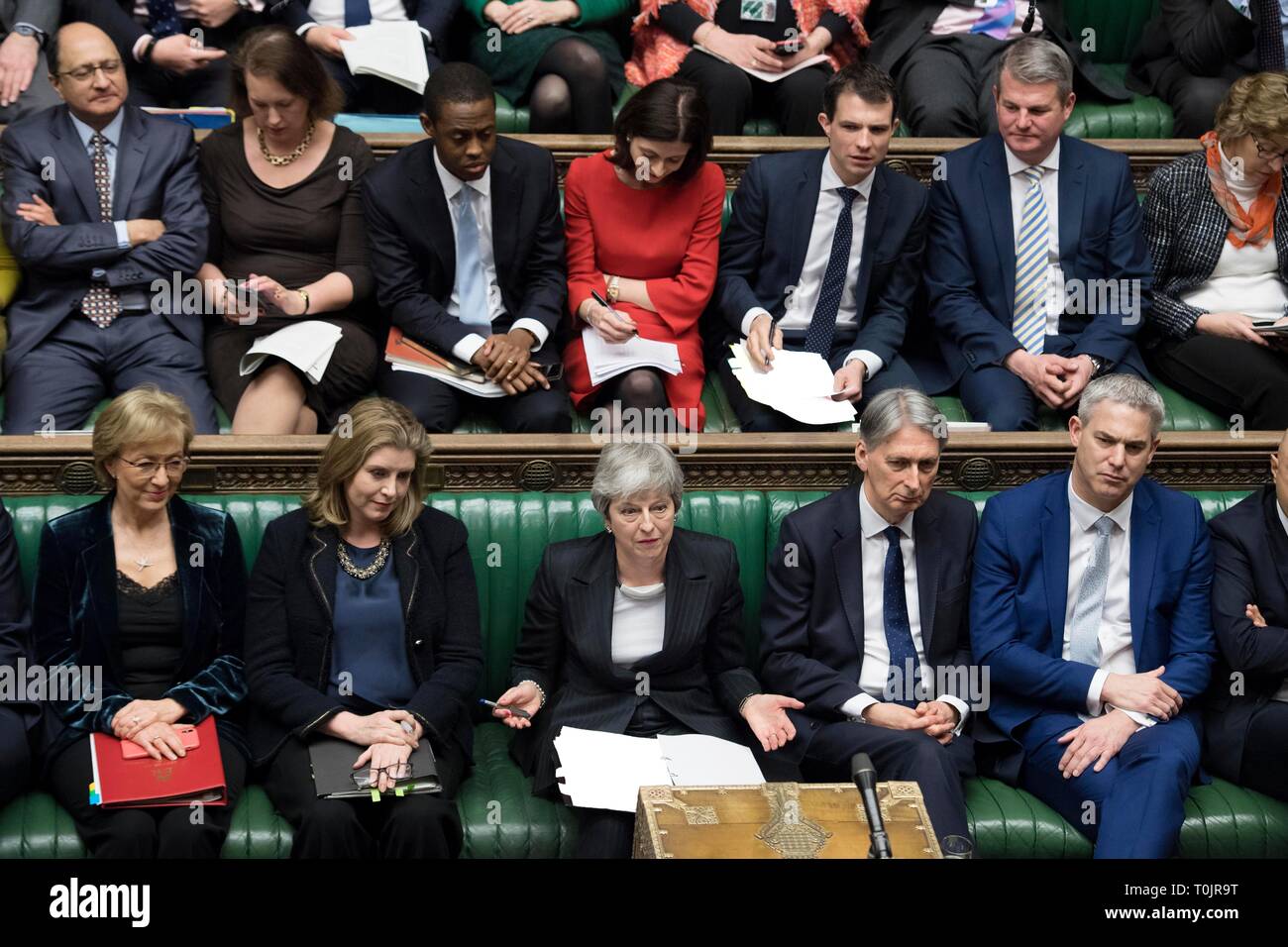 London, UK. 20th Mar, 2019. British Prime Minister Theresa May (C, Front) attends the Prime Minister's Question Time in the House of Commons in London, Britain, on March 20, 2019. Theresa May confirmed Wednesday she has written to the European Union seeking to delay Britain's departure from the bloc until June 30. Credit: UK Parliament/Jessica Taylor/Xinhua/Alamy Live News Stock Photo