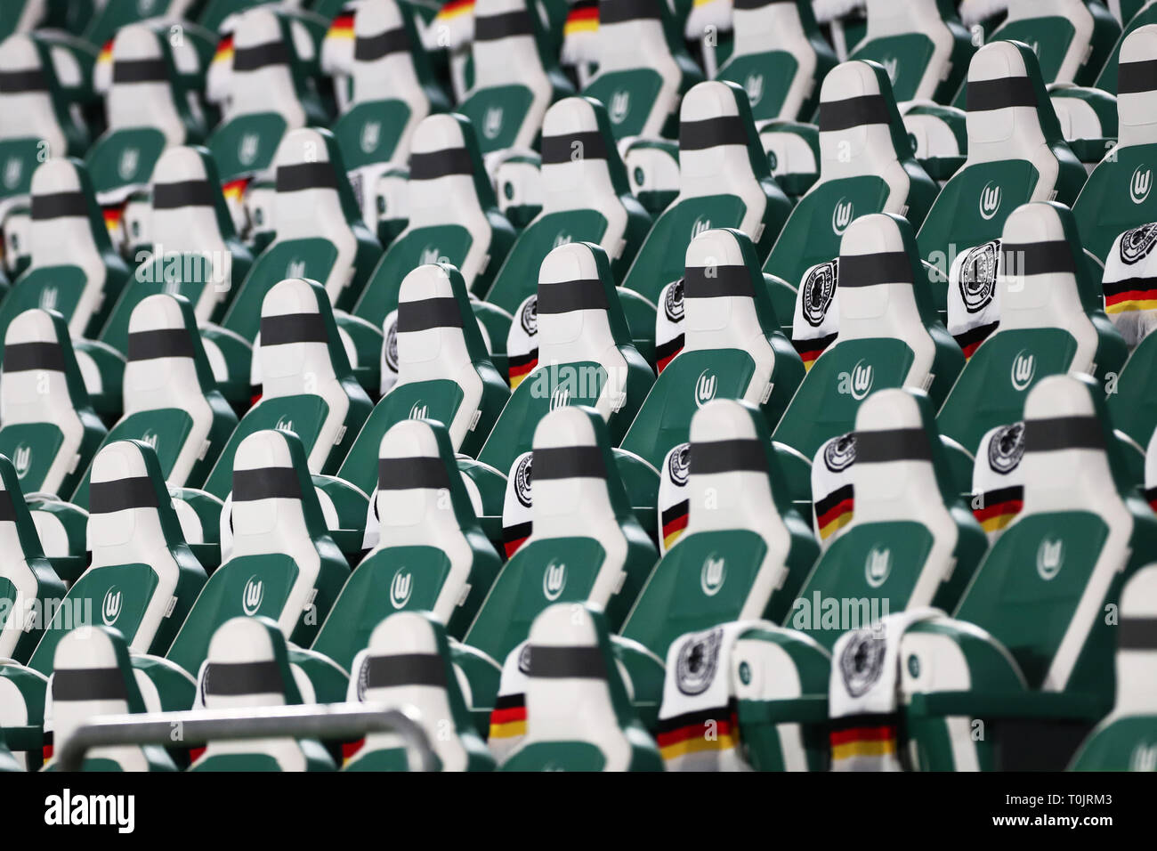 Wolfsburg, Germany. 20th Mar, 2019. Soccer: International match, Germany - Serbia in the Volkswagen Arena. Football scarves from the national team are placed in the grandstand. IMPORTANT NOTE: In accordance with the requirements of the DFL Deutsche Fußball Liga or the DFB Deutscher Fußball-Bund, it is prohibited to use or have used photographs taken in the stadium and/or the match in the form of sequence images and/or video-like photo sequences. Credit: Christian Charisius/dpa/Alamy Live News Stock Photo