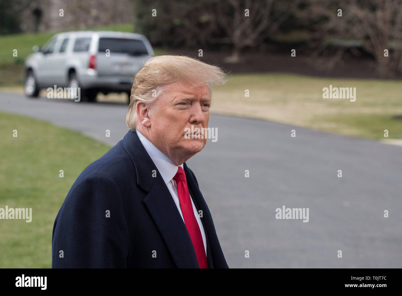 Washington DC, 20 March, 2019, USA: President Donald J Trump holds an impromptu press conference before he leaves the White House to attend a series of meeting and rallies in Ohio. He discussed the on-going conflict in Syria, complained about 'the fake news outlets' and other topics. Patsy Lynch/MediaPunch Stock Photo