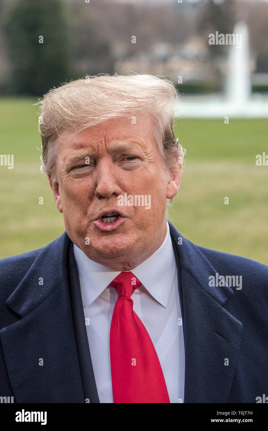 Washington DC, 20 March, 2019, USA: President Donald J Trump holds an impromptu press conference before he leaves the White House to attend a series of meeting and rallies in Ohio. He discussed the on-going conflict in Syria, complained about 'the fake news outlets' and other topics. Patsy Lynch/MediaPunch Stock Photo