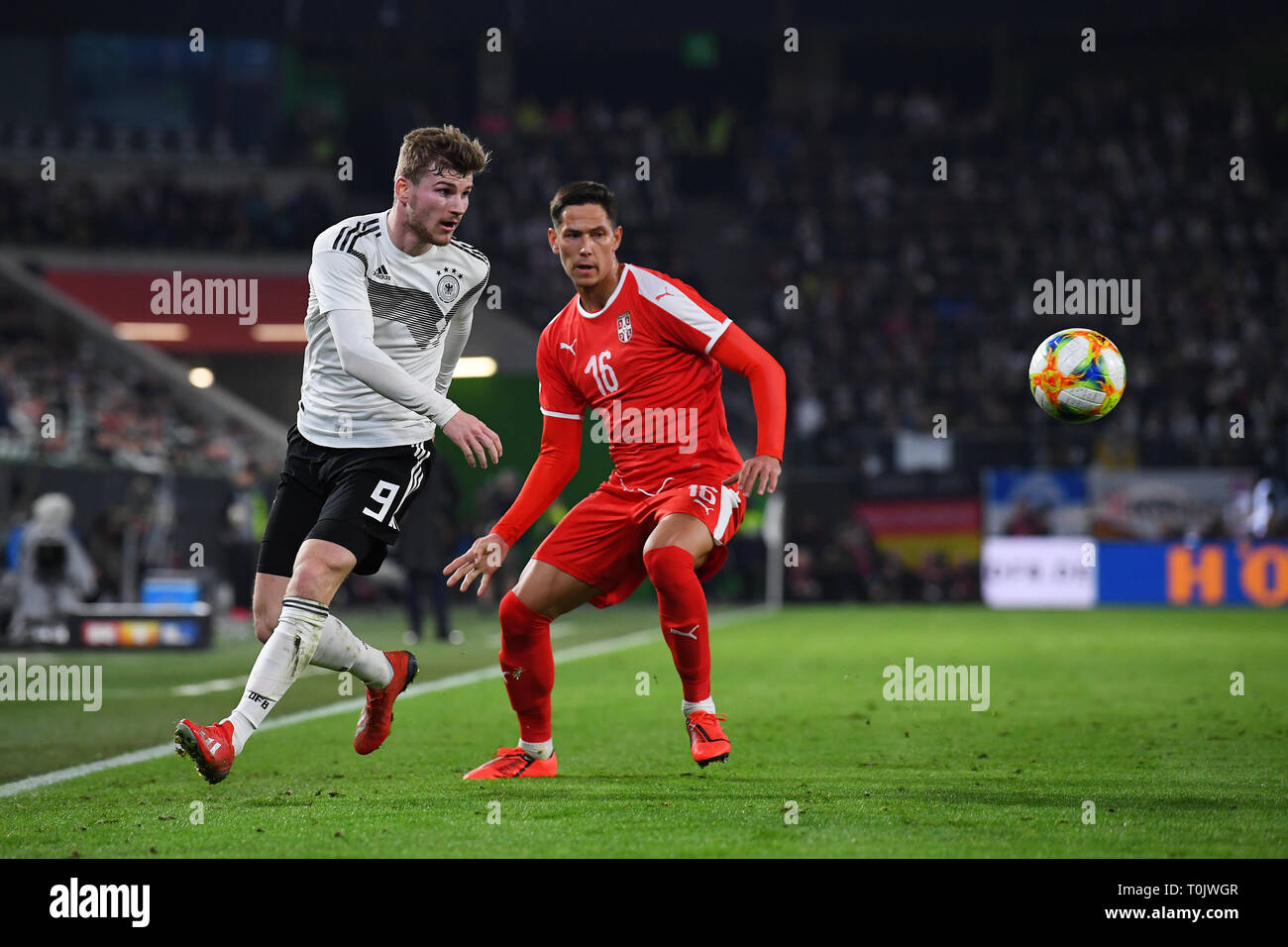 Wolfsburg, Deutschland. 20th Mar, 2019. duels, duel between Timo Werner (Germany) and Sasa Lukic (Serbia). GES/Football/Test Match: Germany - Serbia, 20.03.2019 Football/Soccer: Friendly Match: Gemany vs Serbia, Wolfsburg, March 20, 2019 | usage worldwide Credit: dpa/Alamy Live News Stock Photo