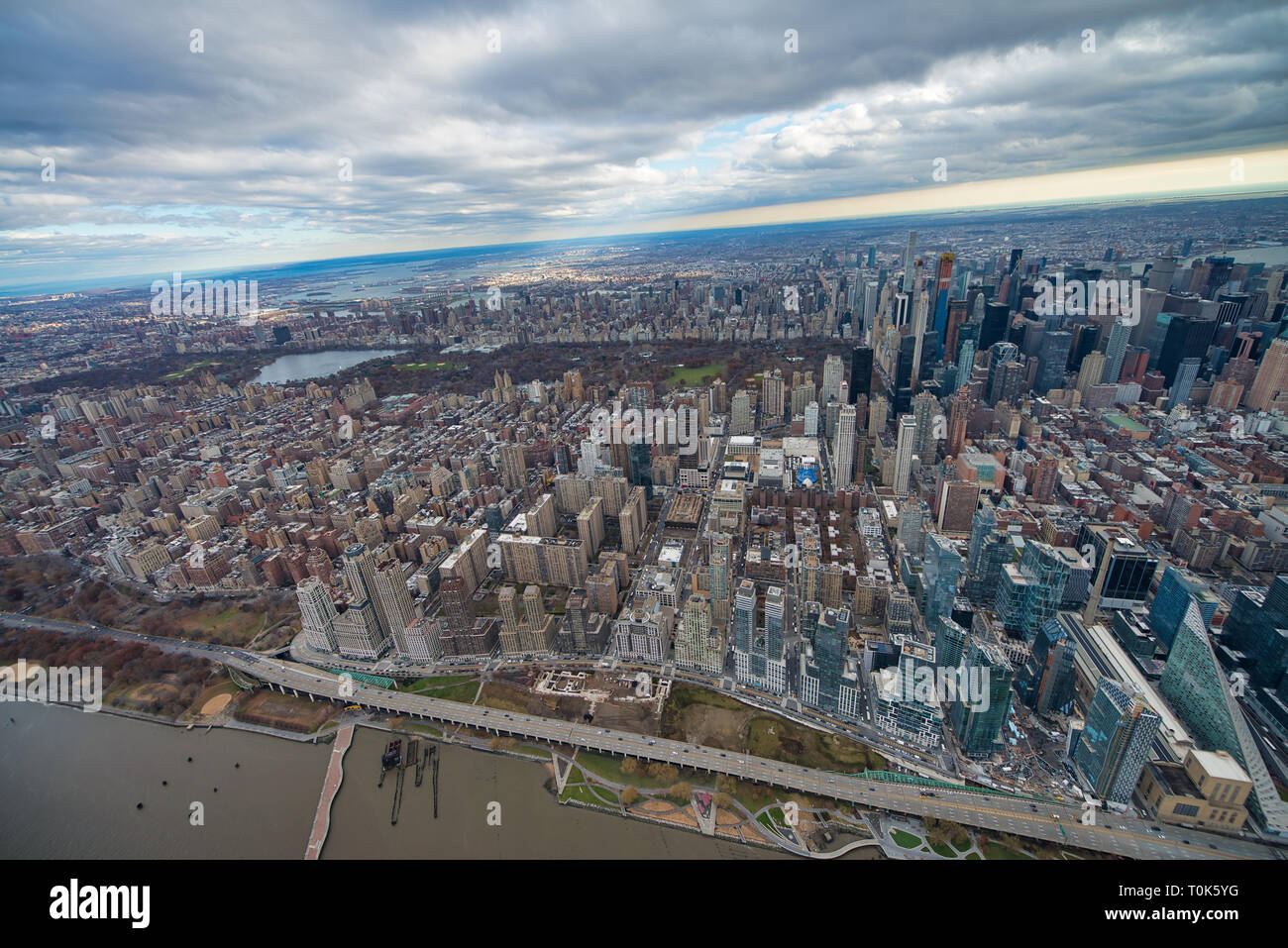 Wide angle aerial view of Midtown Manhattan and Central Park from helicopter, New York City. Stock Photo