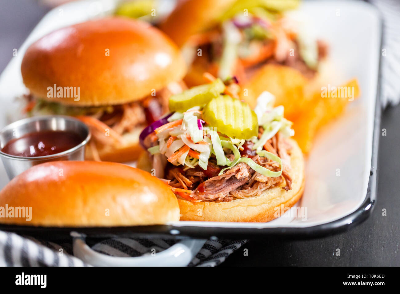 BBQ pulled pork sandwich with coleslaw on brioche buns Stock Photo Alamy