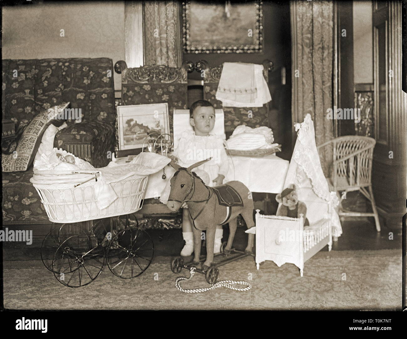 people, children, infant, two-year-old in the children's room with toys, Germany, 1907, Additional-Rights-Clearance-Info-Not-Available Stock Photo