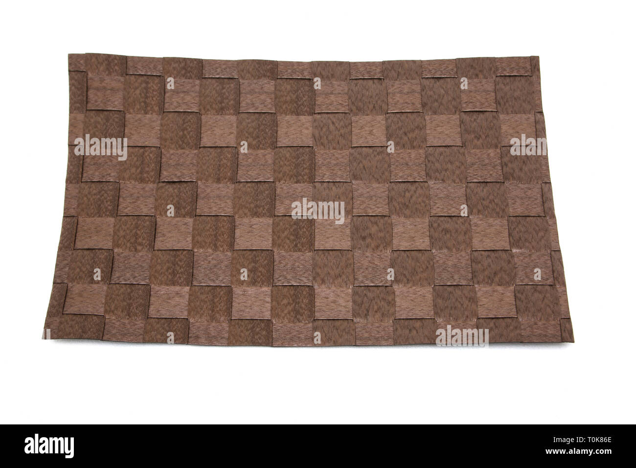 Brown Plaited Plastic Place Mat Stock Photo