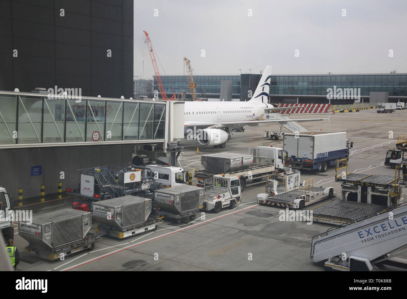 England Heathrow Airport Terminal Two Aegean Airlines Aeroplane Stock Photo