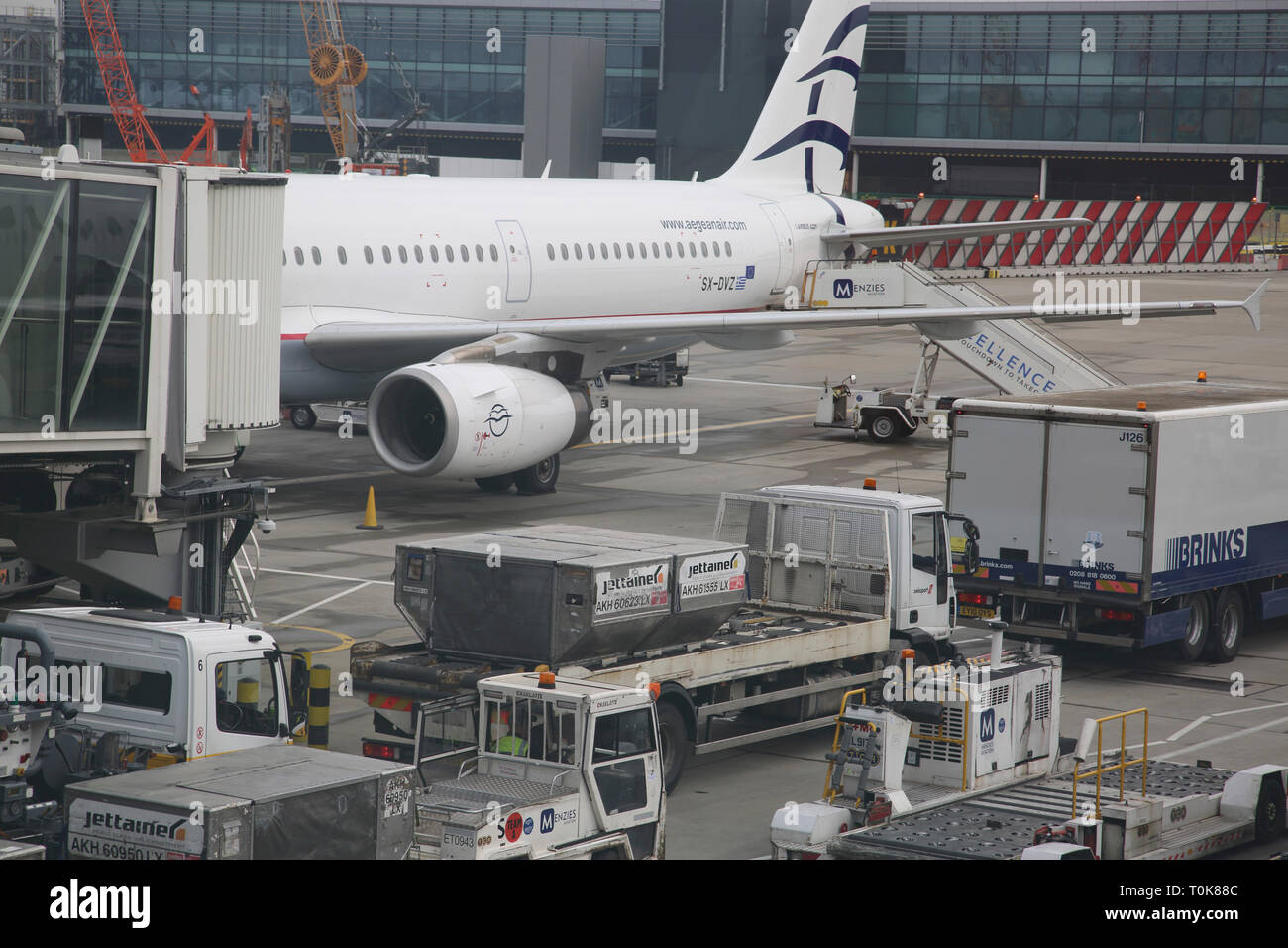 England Heathrow Airport Terminal Two Aegean Airlines Aeroplane Stock Photo