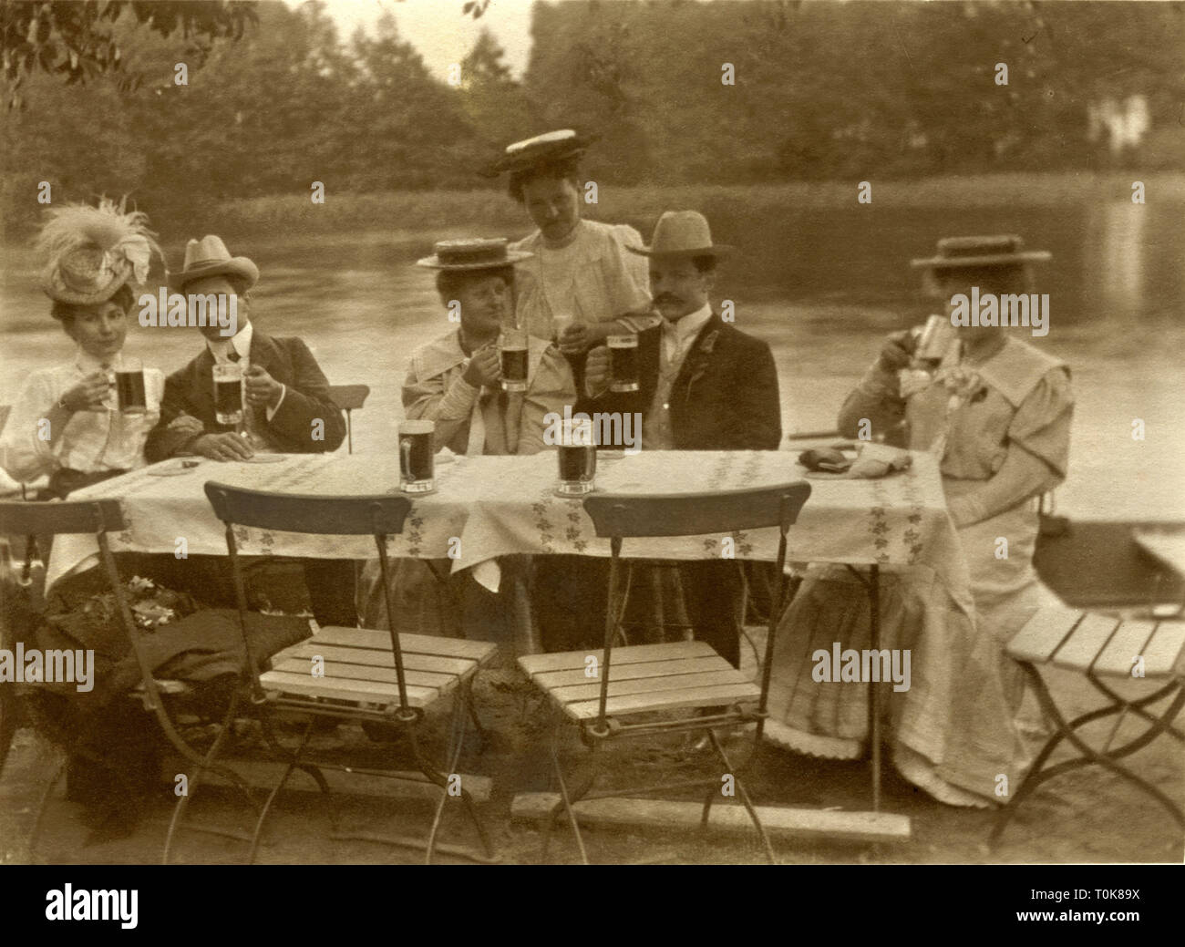 gastronomy, excursion in the beer garden, friends, Germany, circa 1910, Additional-Rights-Clearance-Info-Not-Available Stock Photo